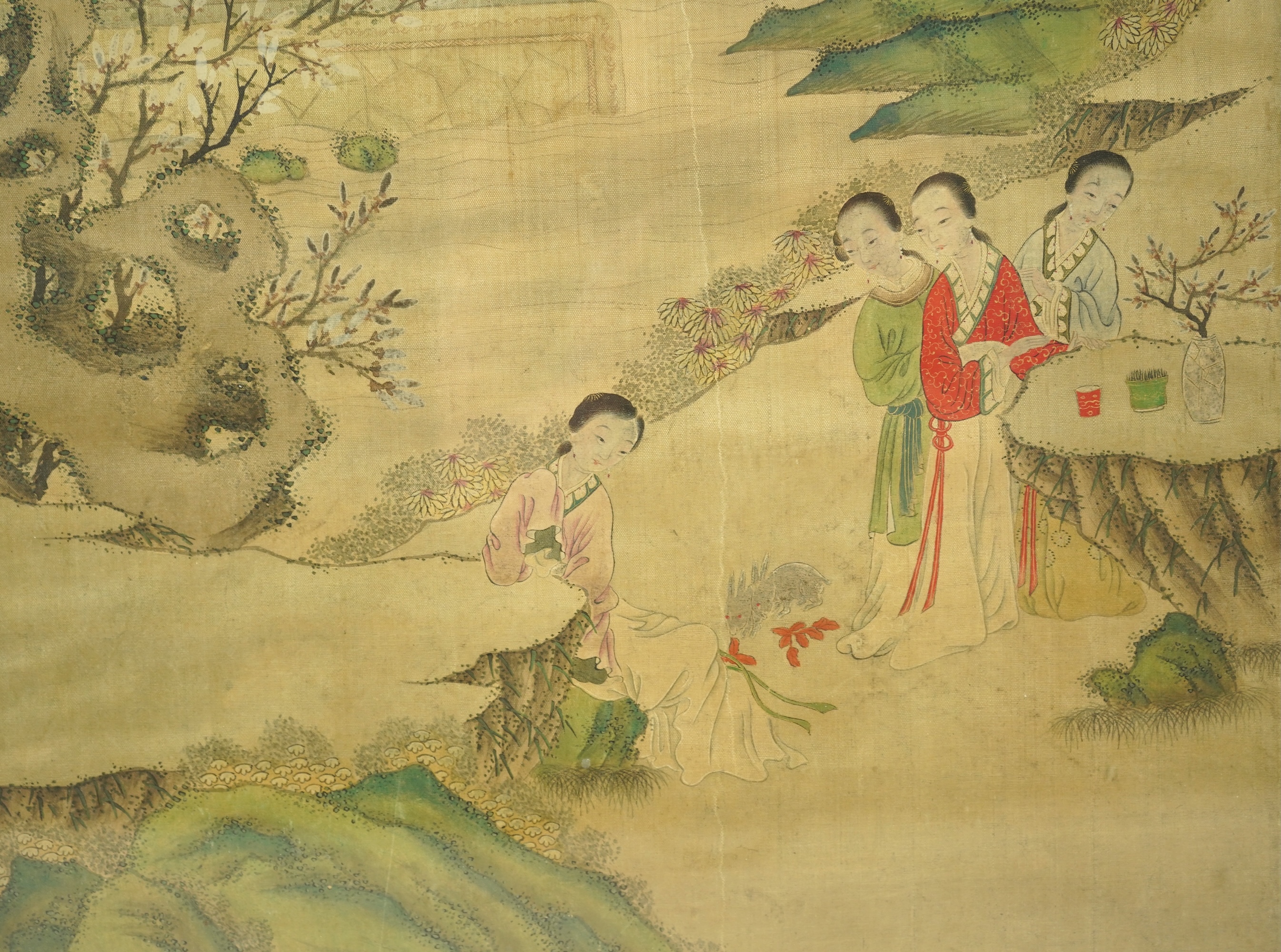 Chinese School , (late 19th century), Ladies in a garden, Ink and colour on silk, 107cm x 41cm, excluding brocade border